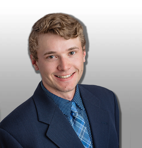 Smiling young man wearing a suit